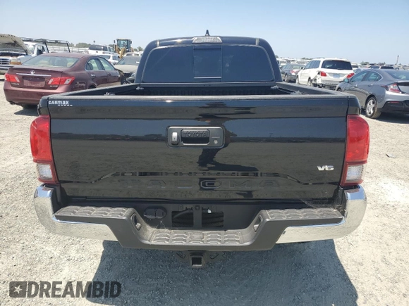 2022 Toyota Tacoma SR5 with VIN 3TMBZ5DN9NM035304, listed as a Copart auction lot 59221575 with 18,008 mi miles and Salvage title. Bid and sale history available at DreamBid. Image 6.