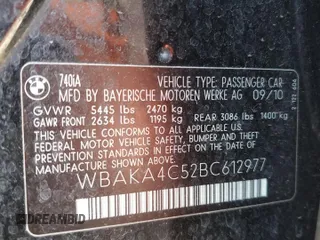 2011 BMW 7 Series 740i with VIN WBAKA4C52BC612977, listed as a Copart auction lot 52582575 with 157,813 mi miles and Salvage Title. Bid and sale history available at carsss.com. Image 12.