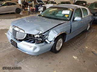 1998 Lincoln Town Car Signature with VIN 1LNFM82W8WY689953, listed as a IAAI auction lot 41357333 with 1 mi miles. Bid and sale history available at carsss.com. Image 17.