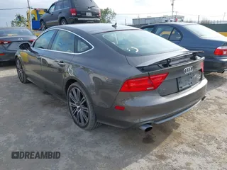 2012 Audi A7 Prestige с VIN WAU2GAFC7CN122113, выставлен на аукционе IAAI как лот 42111441 с пробегом 149 617 миль миль и . История ставок и продаж доступна на DreamBid. Изображение 3.