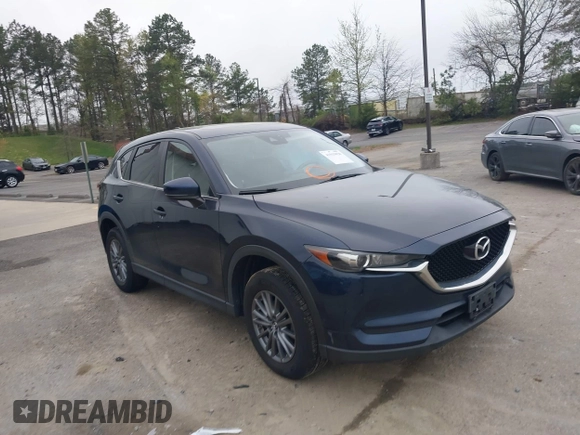 2017 Mazda CX-5 Touring with VIN JM3KFBCL9H0163449, listed as a IAAI auction lot 41919020 with 102,898 mi miles. Bid and sale history available at carsss.com. Image 1.