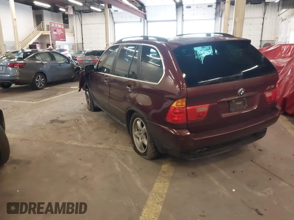 2001 BMW X5 4.4i with VIN WBAFB33561LH24532, listed as a IAAI auction lot 41611503 with 188,671 mi miles. Bid and sale history available at carsss.com. Image 3.