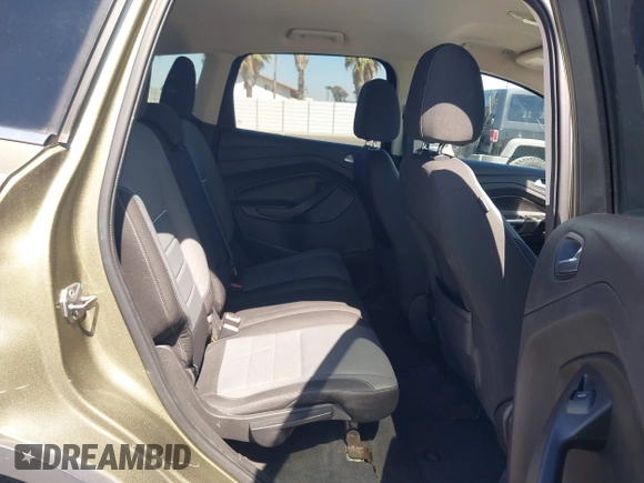2013 Ford Escape SE with VIN 1FMCU0G99DUC05901, listed as a IAAI auction lot 42194672 with 121,435 mi miles and . Bid and sale history available at DreamBid. Image 8.