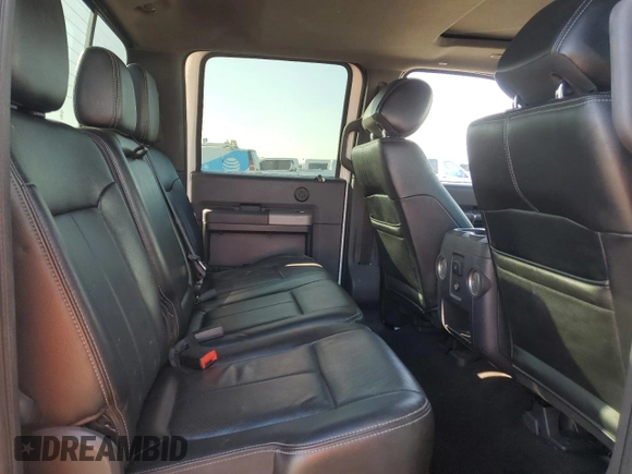 2013 Ford F-350 Platinum z VIN 1FT8W3BT2DEB88006, wystawiony jako Copart lot #42016185 z przebiegiem 169 824 mil mil oraz Szkoda całkowita • Salvage title. Historia ofert i sprzedaży dostępna na DreamBid. Obrazek 10.