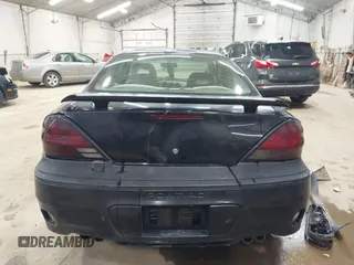 2005 Pontiac Grand Am GT with VIN 1G2NW12E85M140434, listed as a IAAI auction lot 41966294 with 142,548 mi miles. Bid and sale history available at carsss.com. Image 16.