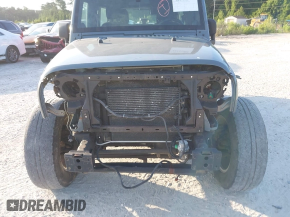 2014 Jeep Wrangler Unlimited Sport with VIN 1C4BJWDG5EL327225, listed as a IAAI auction lot 42547991 with 129,545 mi miles and . Bid and sale history available at DreamBid. Image 6.