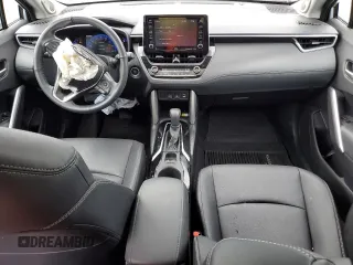 2022 Toyota Corolla Cross XLE with VIN 7MUDAABG2NV009663, listed as a Copart auction lot 55945735 with 59,473 mi miles and Salvage title. Bid and sale history available at DreamBid. Image 8.