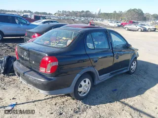 2002 Toyota ECHO with VIN JTDBT123025023104, listed as a IAAI auction lot 41708086 with NaN miles. Bid and sale history available at carsss.com. Image 4.