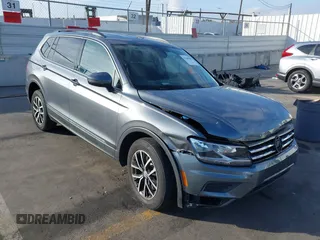 2021 Volkswagen Tiguan SE with VIN 3VV3B7AX8MM071303, listed as a IAAI auction lot 41109686 with 40,684 mi miles and . Bid and sale history available at DreamBid. Image 1.