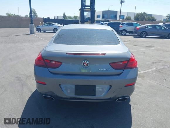 2013 BMW 6 Series 650i with VIN WBAYM9C53DDW20145, listed as a IAAI auction lot 42039618 with 66,684 mi miles and . Bid and sale history available at carsss.com. Image 16.