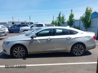 2017 Chevrolet Impala LT with VIN 2G1105S31H9197165, listed as a IAAI auction lot 42303730 with 232,046 mi miles and . Bid and sale history available at DreamBid. Image 14.