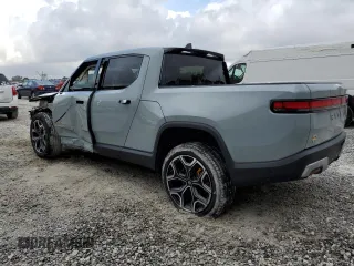 2022 Rivian R1T Launch Edition z VIN 7FCTGAALXNN004228, wystawiony jako Copart lot #43226985 z przebiegiem 4 mil mil oraz Szkody całkowita. Historia ofert i sprzedaży dostępna na DreamBid. Obrazek 2.