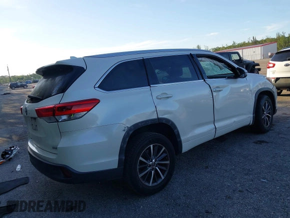 2018 Toyota Highlander SE with VIN 5TDKZRFH6JS534716, listed as a IAAI auction lot 42554743 with 154,636 mi miles and . Bid and sale history available at DreamBid. Image 4.