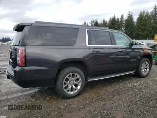 2015 GMC Yukon XL SLT with VIN 1GKS2HKC7FR282543, listed as a Copart auction lot 45602075 with 153,913 mi miles and Clean Title. Bid and sale history available at carsss.com. Image 3.