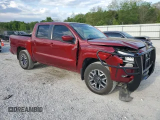 2024 Nissan Frontier SL with VIN 1N6ED1EK4RN659447, listed as a Copart auction lot 53338105 with 4,895 mi miles and Salvage title. Bid and sale history available at DreamBid. Image 4.