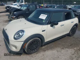 2020 MINI Hardtop 4 Door Cooper with VIN WMWXU7C01L2M54710, listed as a IAAI auction lot 42385956 with 55,714 mi miles and . Bid and sale history available at DreamBid. Image 17.