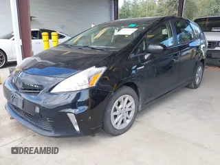 2014 Toyota Prius Two with VIN JTDZN3EU4E3315900, listed as a IAAI auction lot 40082095 with 167,748 mi miles and . Bid and sale history available at DreamBid. Image 2.