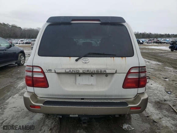 2004 Toyota Land Cruiser with VIN JTEHT05JX42067402, listed as a Copart auction lot 88976025 with 350,518 mi miles and Salvage Title. Bid and sale history available at carsss.com. Image 6.