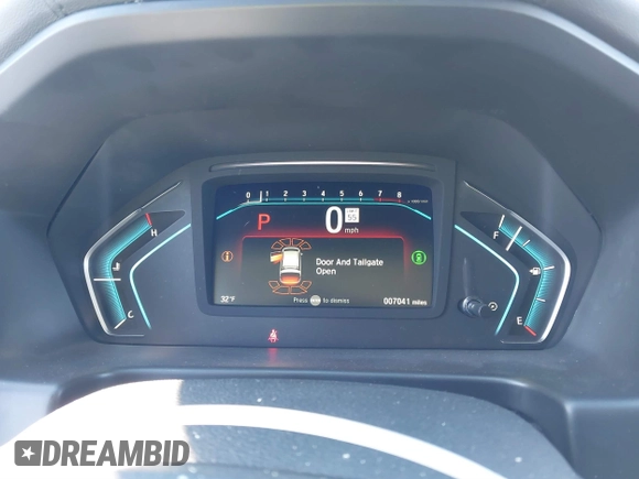 2023 Honda Odyssey Touring with VIN 5FNRL6H80PB005769, listed as a IAAI auction lot 41280858 with 7,041 mi miles and . Bid and sale history available at DreamBid. Image 7.