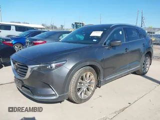 2019 Mazda CX-9 Grand Touring with VIN JM3TCADY8K0335429, listed as a IAAI auction lot 41203657 with 94,333 mi miles. Bid and sale history available at carsss.com. Image 2.