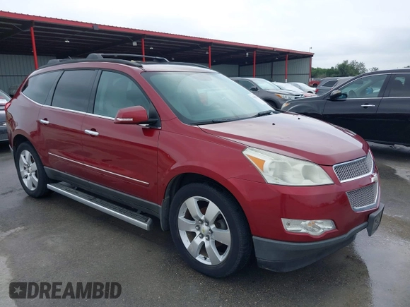 2011 Chevrolet Traverse LTZ z VIN 1GNKRLED6BJ142238, wystawiony jako IAAI lot #42183153 z przebiegiem 149 483 mil mil oraz . Historia ofert i sprzedaży dostępna na DreamBid. Obrazek 1.