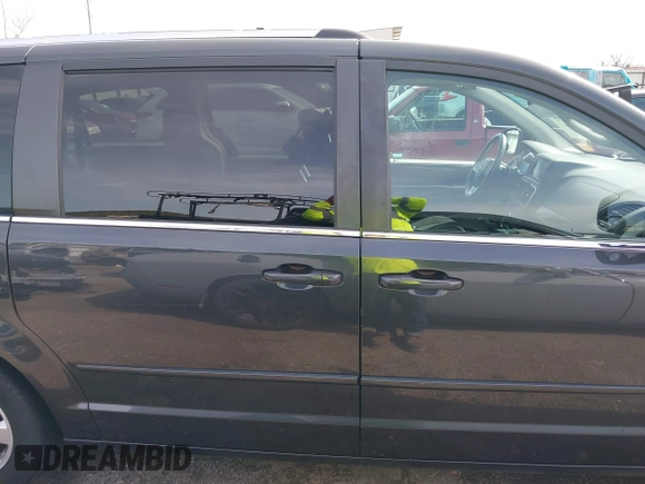 2011 Dodge Grand Caravan Crew with VIN 2D4RN5DG3BR660235, listed as a IAAI auction lot 41945522 with 148,924 mi miles and . Bid and sale history available at DreamBid. Image 13.