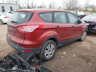 2016 Ford Escape S with VIN 1FMCU0F74GUC23033, listed as a IAAI auction lot 42018080 with 77,079 mi miles. Bid and sale history available at carsss.com. Image 4.