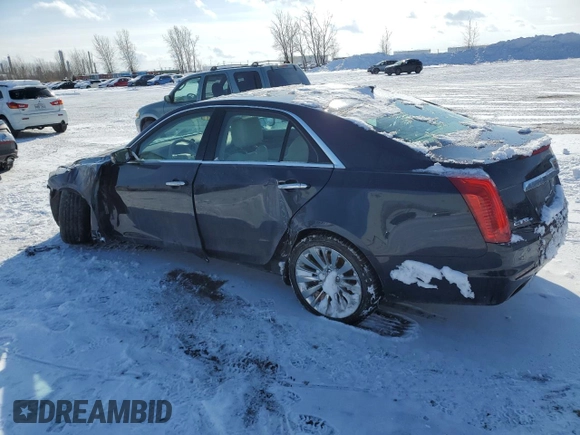 2015 Cadillac CTS Luxury AWD with VIN 1G6AX5SX5F0142864, listed as a Copart auction lot 44492445 with 87,199 mi miles and Salvage Title. Bid and sale history available at DreamBid. Image 2.