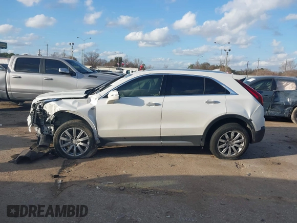 2021 Cadillac XT4 FWD Premium Luxury with VIN 1GYFZCR47MF084998, listed as a IAAI auction lot 41483283 with 1 mi miles. Bid and sale history available at carsss.com. Image 13.