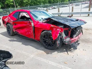 2016 Dodge Challenger R/T Plus z VIN 2C3CDZBT9GH284817, wystawiony jako IAAI lot #42270251 z przebiegiem 129 928 mil mil oraz . Historia ofert i sprzedaży dostępna na DreamBid. Obrazek 1.