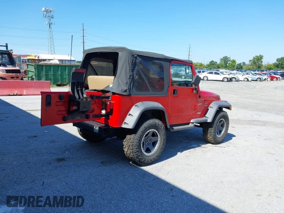 1999 Jeep Wrangler Sport with VIN 1J4FY19S0XP468304, listed as a IAAI auction lot 40038580 with 123,247 mi miles. Bid and sale history available at carsss.com. Image 4.