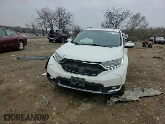 2018 Honda CR-V Touring with VIN 2HKRW2H98JH695059, listed as a Copart auction lot 86452054 with 114,437 mi miles and Salvage Title. Bid and sale history available at DreamBid. Image 11.