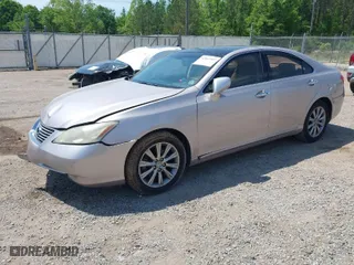 2009 Lexus ES 350 with VIN JTHBJ46G992341673, listed as a IAAI auction lot 42061907 with 157,945 mi miles. Bid and sale history available at carsss.com. Image 2.