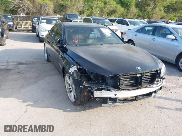 2013 BMW 7 Series 750i with VIN WBAYA8C59DC996552, listed as a IAAI auction lot 41921201 with 99,188 mi miles and . Bid and sale history available at DreamBid. Image 1.