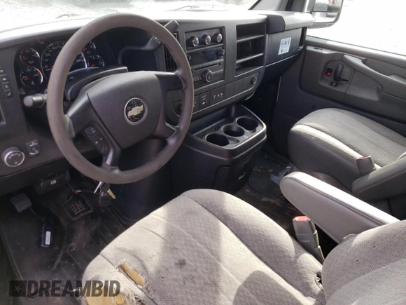 2014 Chevrolet Express Passenger LT with VIN 1GAZG1FG2E1202457, listed as a Copart auction lot 82704884 with 142,982 mi miles and Salvage title. Bid and sale history available at DreamBid. Image 8.