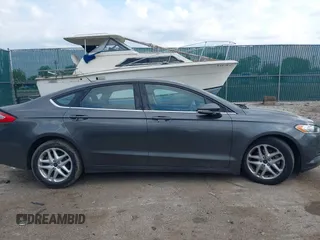 2016 Ford Fusion SE with VIN 3FA6P0H78GR164748, listed as a IAAI auction lot 42209658 with 102,927 mi miles and . Bid and sale history available at DreamBid. Image 13.