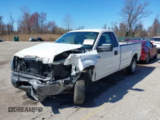 2014 Ford F-150 XL with VIN 1FTMF1CM1EKE41667, listed as a IAAI auction lot 41847599 with 31,671 mi miles and . Bid and sale history available at DreamBid. Image 2.