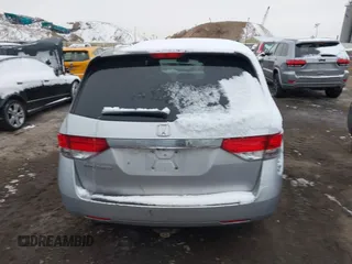 2014 Honda Odyssey LX with VIN 5FNRL5H22EB080346, listed as a IAAI auction lot 41282783 with 101,000 mi miles and . Bid and sale history available at carsss.com. Image 16.