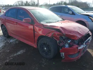 2015 Mitsubishi Lancer ES z VIN JA32U2FU8FU009872, wystawiony jako IAAI lot #41410450 z przebiegiem 185 946 mil mil oraz . Historia ofert i sprzedaży dostępna na DreamBid. Obrazek 1.