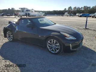 2014 Nissan 370Z Touring with VIN JN1AZ4FH3EM620195, listed as a Copart auction lot 83207104 with 66,974 mi miles and Salvage Title. Bid and sale history available at DreamBid. Image 4.
