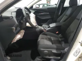 2022 Mazda CX-30 S with VIN 3MVDMBAL9NM410566, listed as a Copart auction lot 50513215 with 26,852 mi miles and Salvage Title. Bid and sale history available at DreamBid. Image 7.