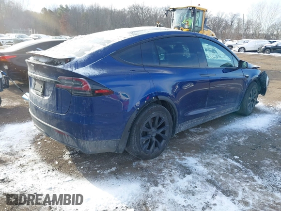 2022 Tesla Model X Plaid z VIN 7SAXCBE69NF343318, wystawiony jako IAAI lot #41387403 z przebiegiem Nie podano mil oraz . Historia ofert i sprzedaży dostępna na DreamBid. Obrazek 4.