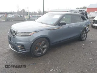 2021 Land Rover Range Rover Velar R-Dynamic S z VIN SALYT2EX7MA313759, wystawiony jako IAAI lot #41694731 z przebiegiem Nie podano mil oraz . Historia ofert i sprzedaży dostępna na DreamBid. Obrazek 18.