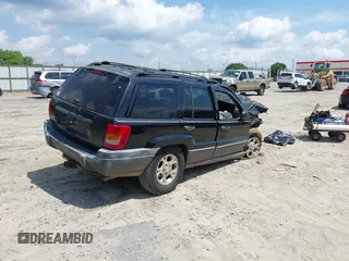 2000 Jeep Grand Cherokee Laredo with VIN 1J4G248SXYC365442, listed as a IAAI auction lot 42285521 with Not provided miles and . Bid and sale history available at DreamBid. Image 4.