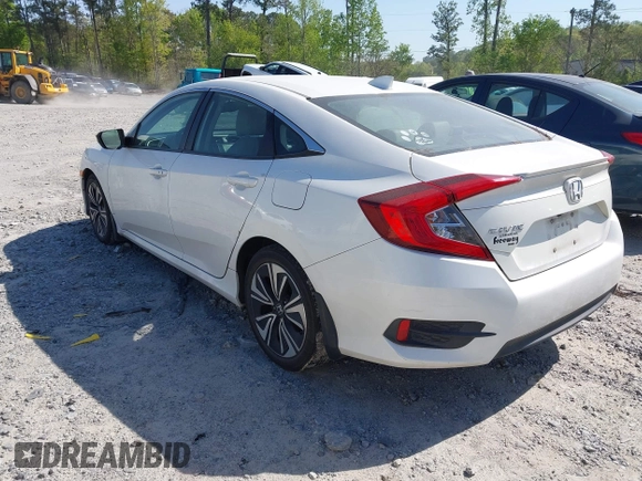 2018 Honda Civic EX-L z VIN 19XFC1F70JE000634, wystawiony jako IAAI lot #42020912 z przebiegiem 156 030 mil mil oraz . Historia ofert i sprzedaży dostępna na DreamBid. Obrazek 3.