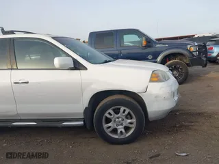 2005 Acura MDX Touring with VIN 2HNYD18665H558857, listed as a IAAI auction lot 41829809 with 157,147 mi miles. Bid and sale history available at carsss.com. Image 14.