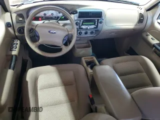 2004 Ford Explorer Sport Trac XLS with VIN 1FMZU77K74UB23543, listed as a Copart auction lot 62859625 with 96,873 mi miles and Salvage title. Bid and sale history available at DreamBid. Image 8.