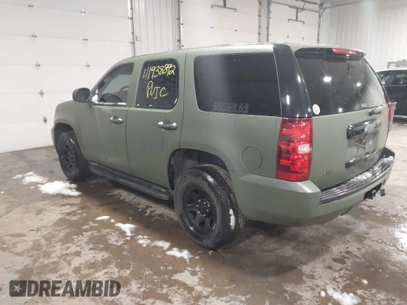 2014 Chevrolet Tahoe Commercial with VIN 1GNSK2E05ER196941, listed as a IAAI auction lot 41938892 with 176,170 mi miles and . Bid and sale history available at DreamBid. Image 3.
