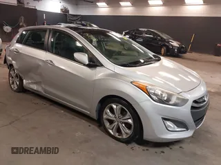 2013 Hyundai Elantra GT with VIN KMHD35LE2DU105677, listed as a IAAI auction lot 42027623 with 137,063 mi miles. Bid and sale history available at carsss.com. Image 1.
