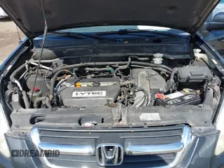 2002 Honda CR-V LX with VIN JHLRD68402C018458, listed as a IAAI auction lot 42206935 with 212,229 mi miles and . Bid and sale history available at carsss.com. Image 10.